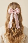 hårspænde til børn, elegant hårpynt, sløjfe til børn, festligt hårspænde, håraccessory til piger, hårspænde med perler, lyserød sløjfe, børnetilbehør til fest, gave til børn