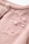 Pige-bolero Ada pink i blød strik bagside og detalje, pink festtøj børn, ZOYA Fashion Danmark